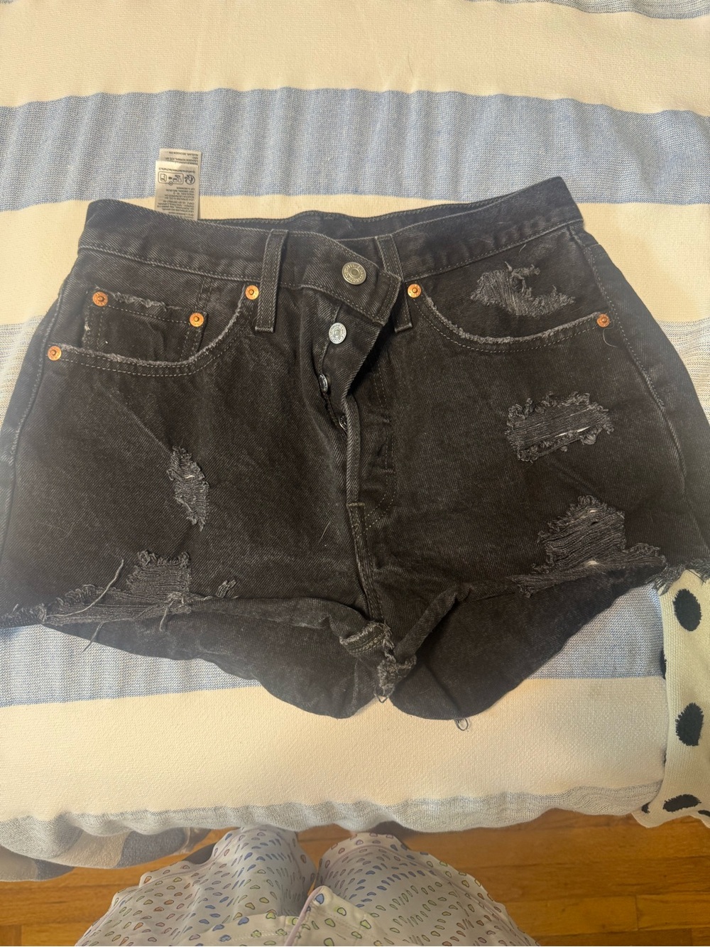 Levi's Distressed Black Denim Cutoff Shorts